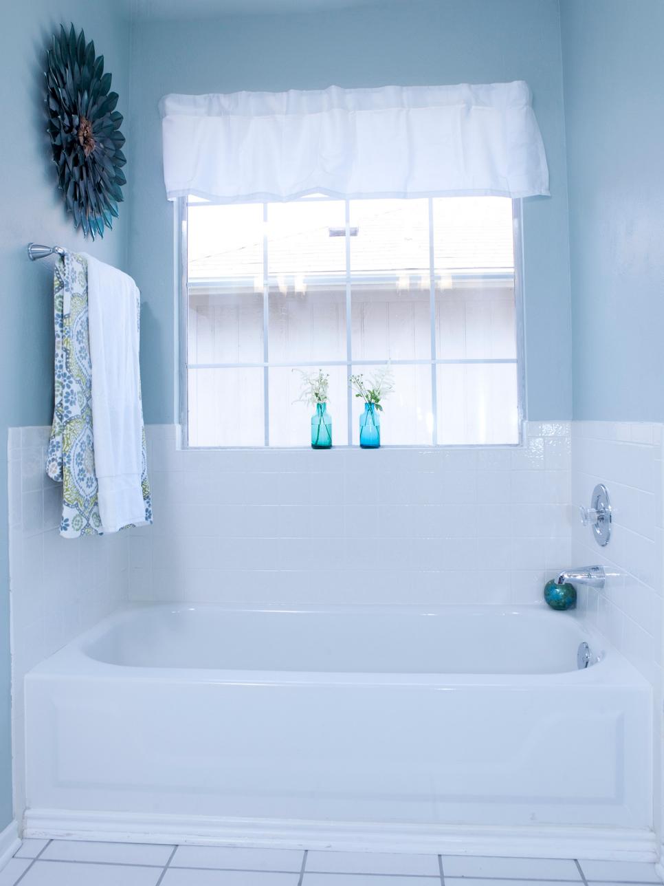 White and Gray Bathroom with Window White and Gray Bathroom with Window and Wall Art