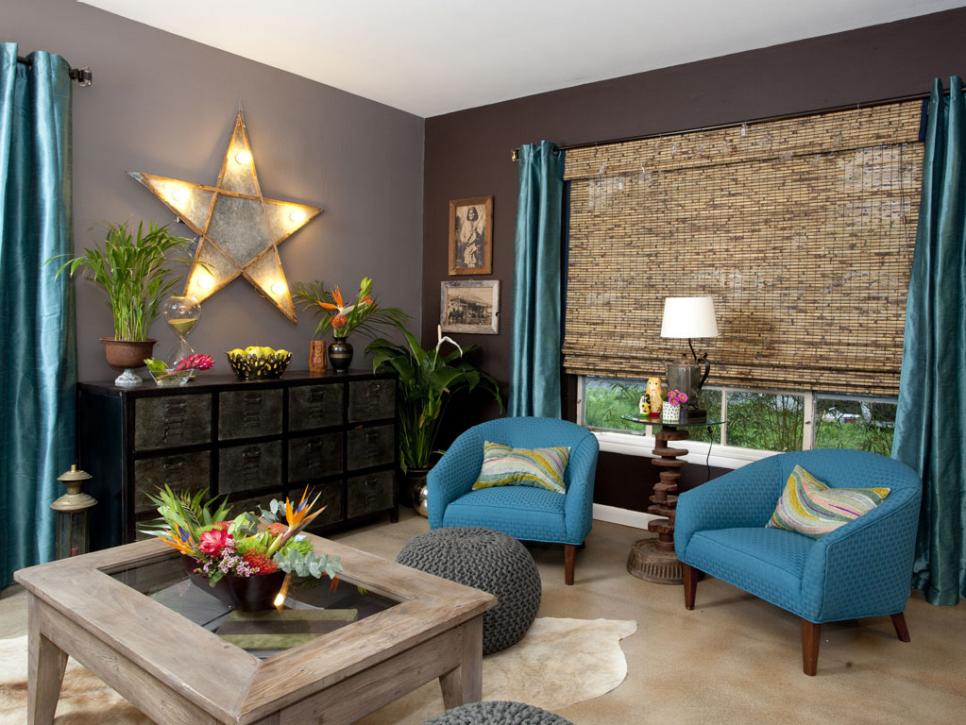 Eclectic Living Room With Storage Shelf, Blue Armchairs and Star Light