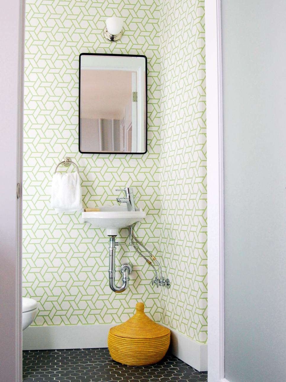 Tropical-Inspired Power Room with Wall-Mounted Sink