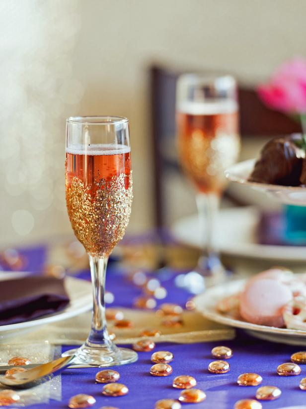 romantic tablescape with diy glitter champagne flutes