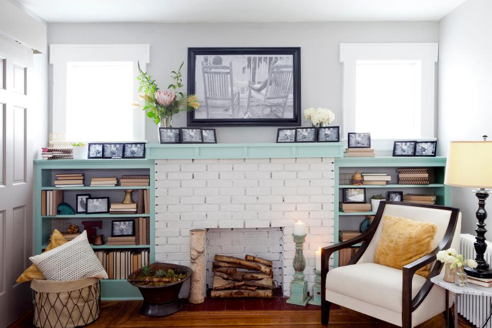 Transitional Brick Fireplace With Black and White Photos