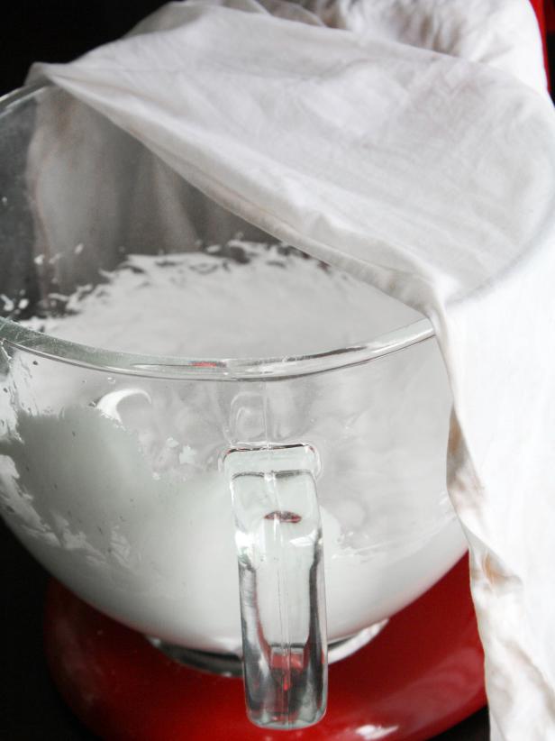 Put icing in a piping bag and use to assemble your gingerbread house pieces. Cover remaining royal icing with a damp towel to prevent crusting.