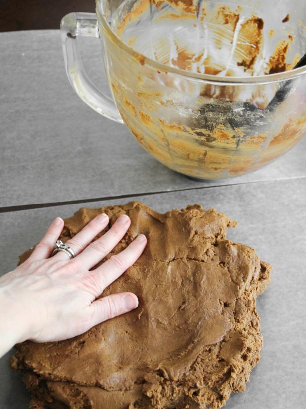 Gather gingerbread dough into ball and divide in half. Form each half into ball and flatten into disk. Wrap disks separately in plastic and chill until firm, at least 4 hours.