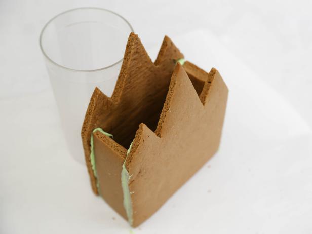 In step 10 of this project, coat the remaining front/back pieces and short ends with candy melt and position between the side pieces on the open end. Let stand until set.