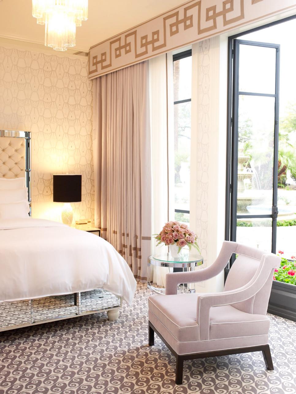 Armchair and Mirror Bed Frame in Traditional Neutral Bedroom