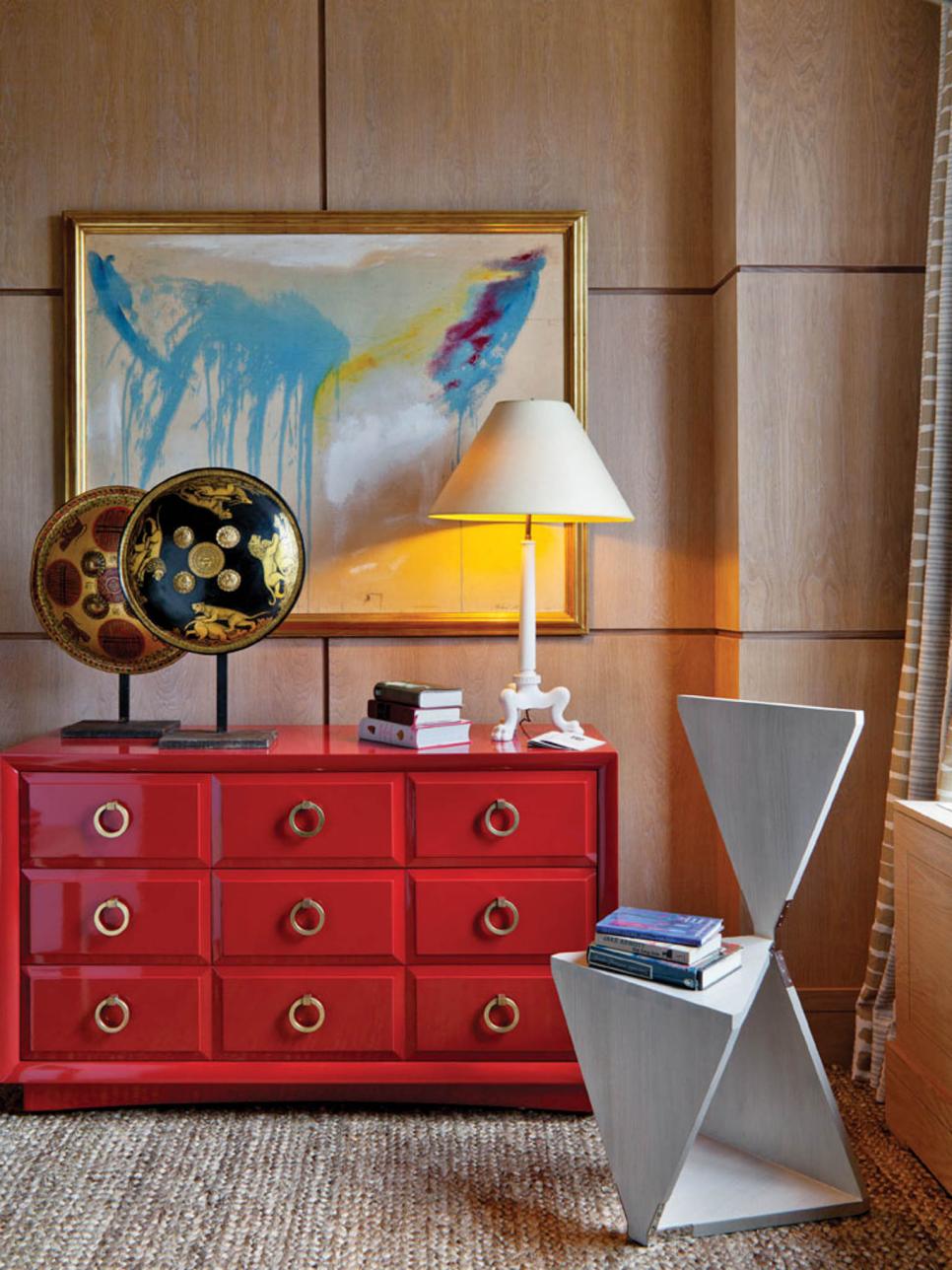 Eclectic Home Office With Red Dresser, Oak Paneling and Modern Chair