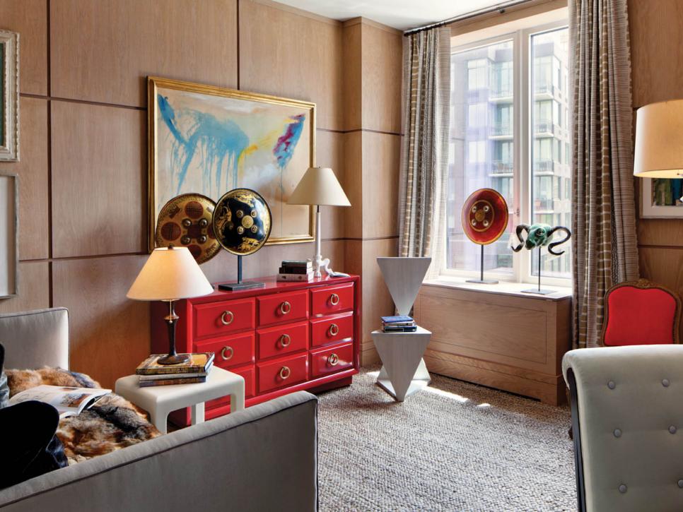 Eclectic Home Office With Wood Paneling and Red Dresser