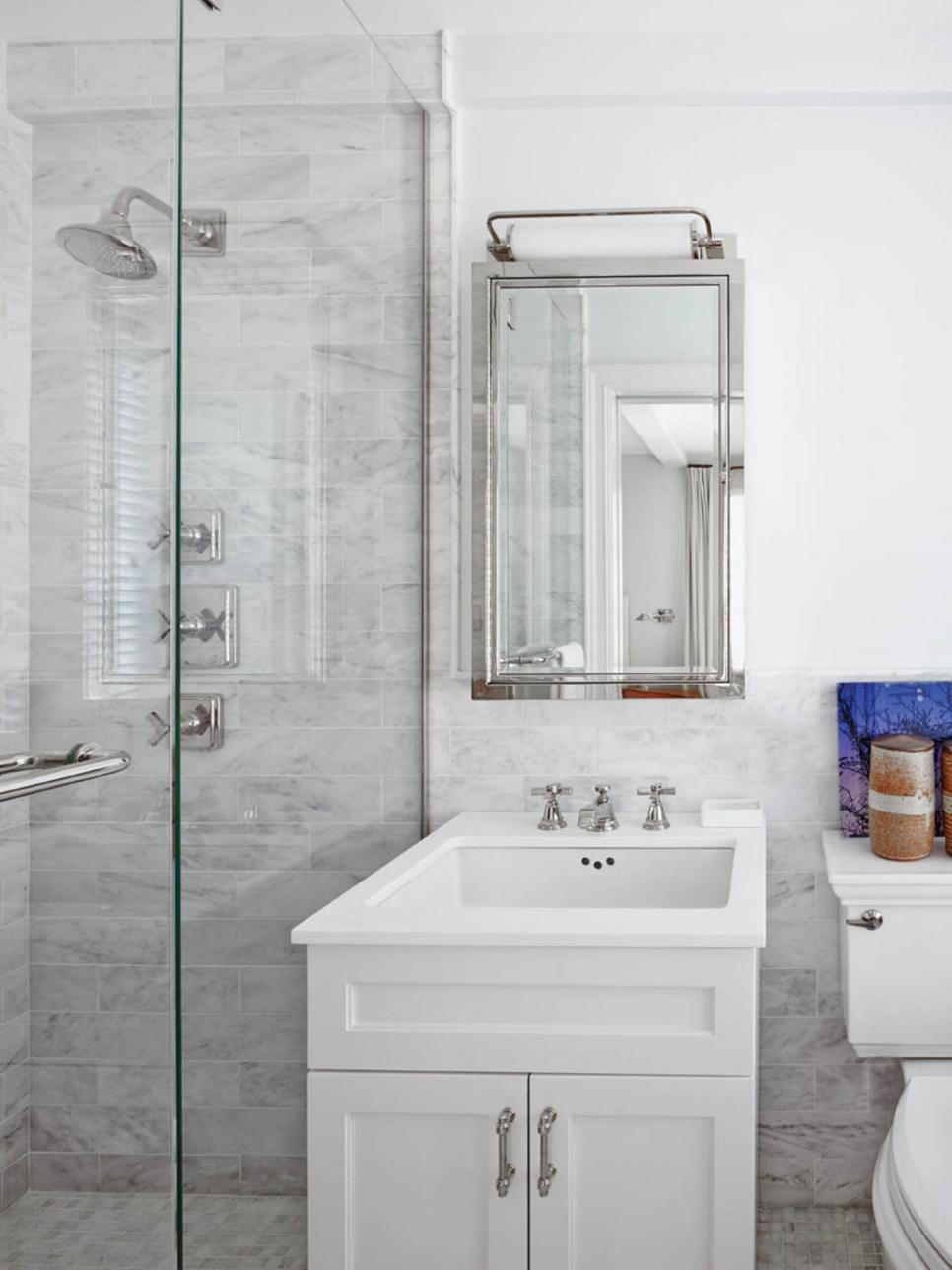Traditional All White Bathroom With Marble Tile White Bathroom with Marble, Mosaic Tile and Glass Shower