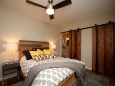 Master Bedroom With Distressed Barn Doors