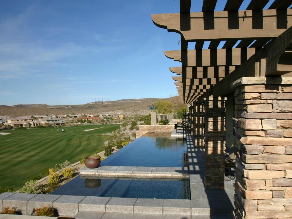 Infinity Pool with Pergola Overlooking Golf Course