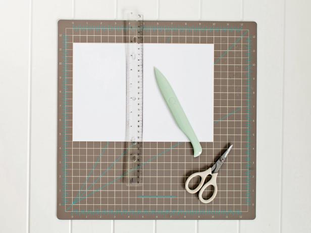 Ruler and Bone Folder on Cutting Mat to Fold White Card Stock