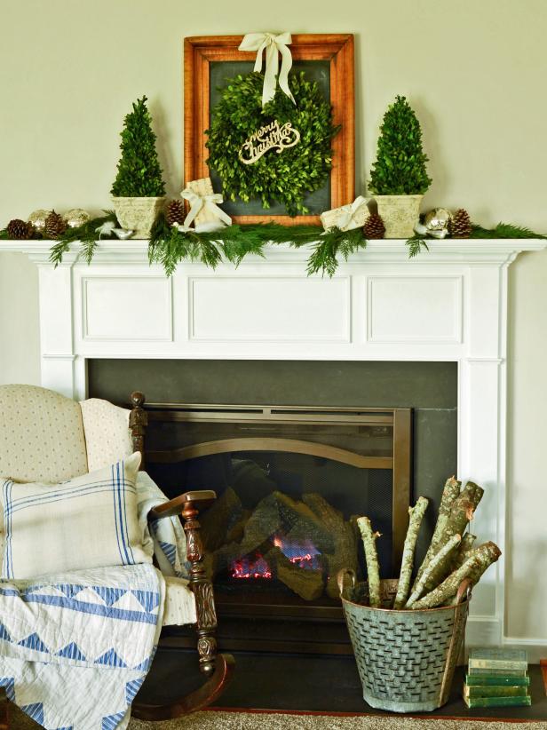 White Mantel With Holiday Greenery and Wreath White Mantel With Holiday Greenery and Wreath