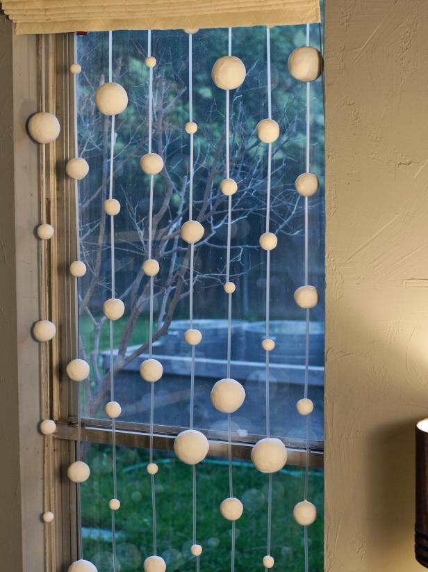 Completed Snowflake Dressing Hanging in Window Completed Snowflake Dressing Hanging in Window