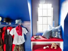 Red and White Window Seat in Boy's Blue Bedroom