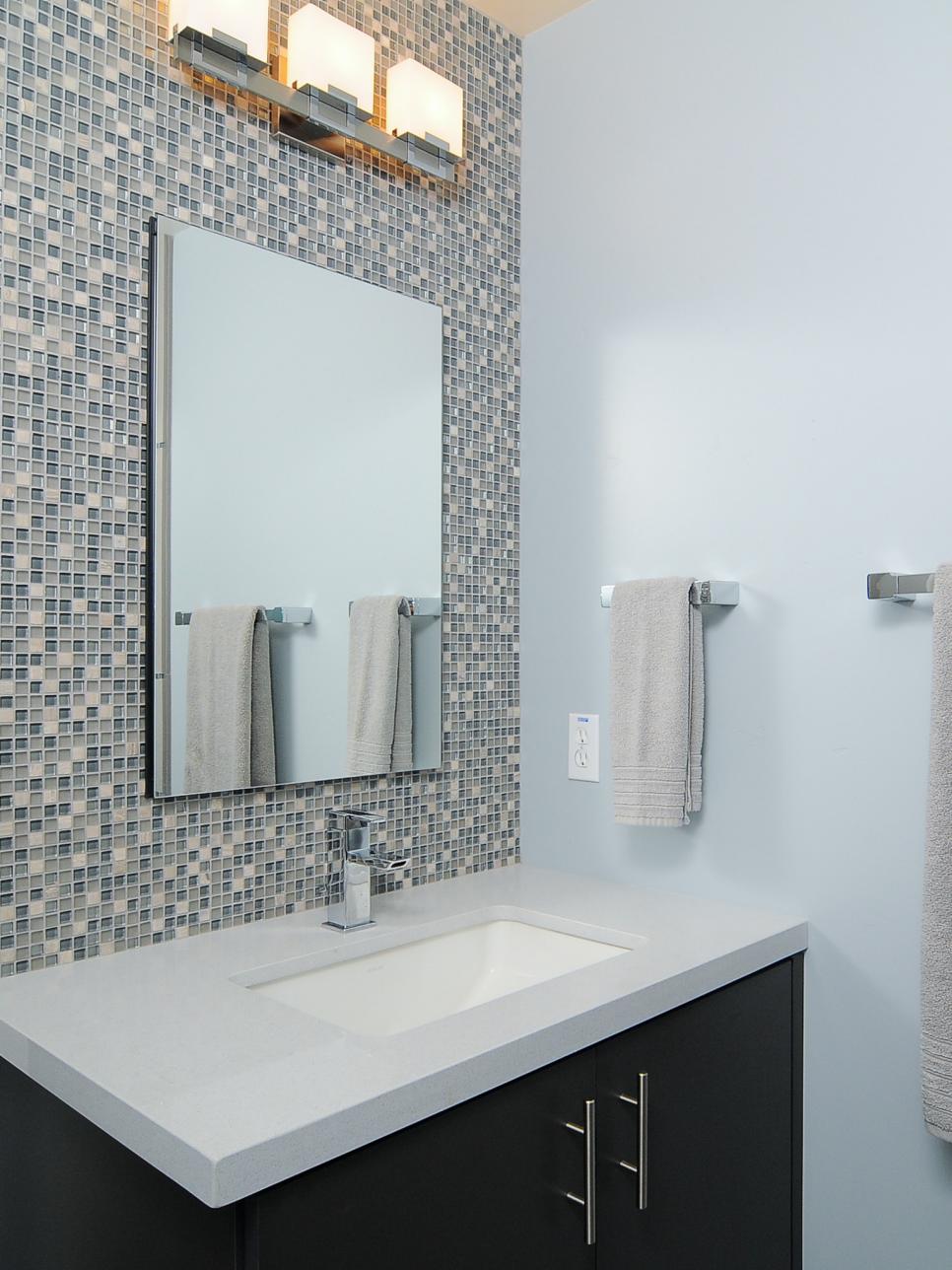 Contemporary Blue Bathroom With Dark Vanity and Mosaic Tile Backsplash