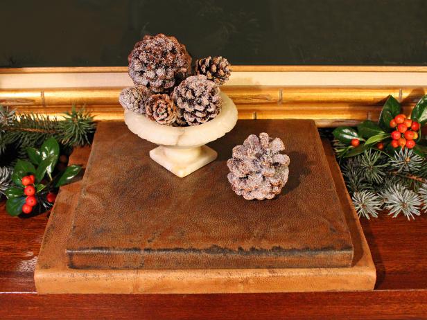 Make brand new books look like old leather-bound tomes by covering them in a removable leather jacket that you've distressed and antiqued. They'll add a timeworn touch to your bookcase and make great handmade gifts for literary friends.