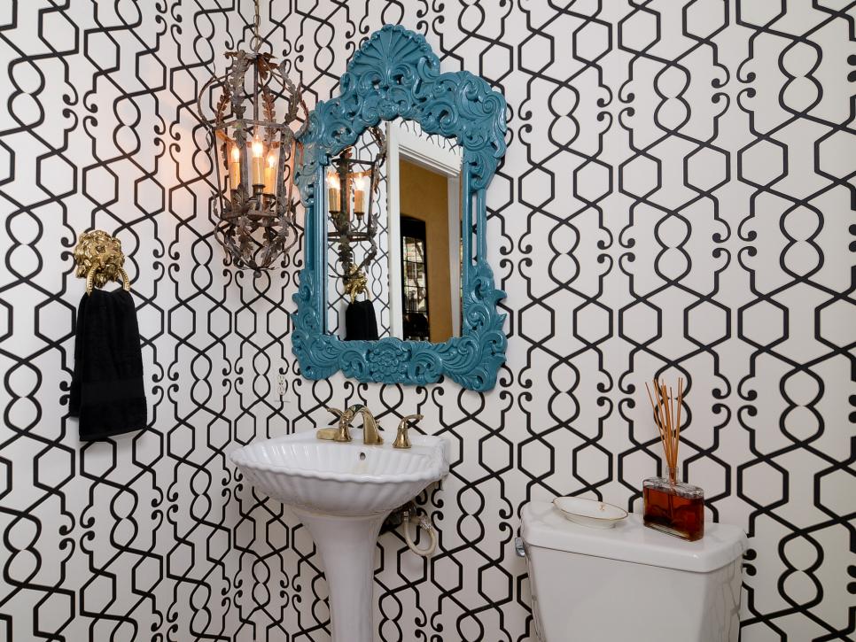 Black and White Bathroom With Blue Framed Mirror