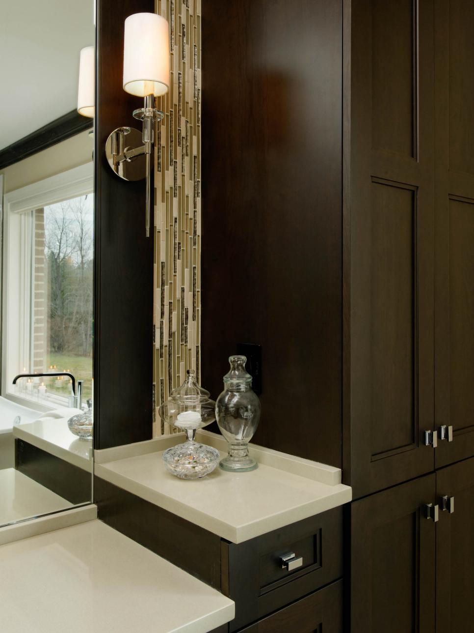 Brown Bathroom Cabinets With Vertical Glass Tile Backsplash