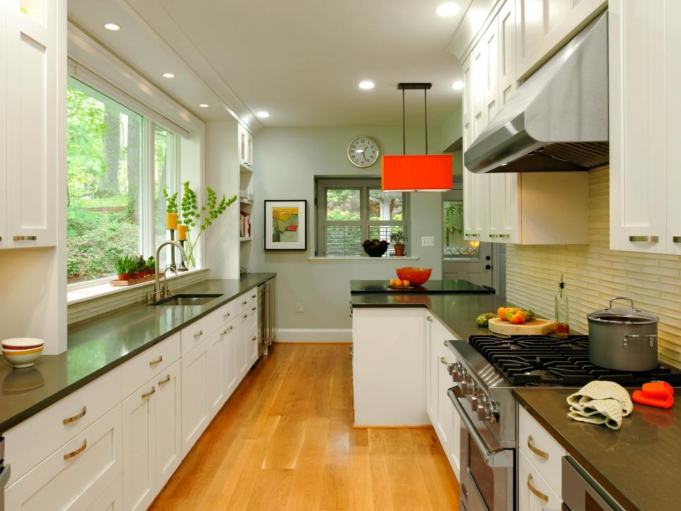 Contemporary Galley Kitchen with Orange Pendant and Hardwood Floors