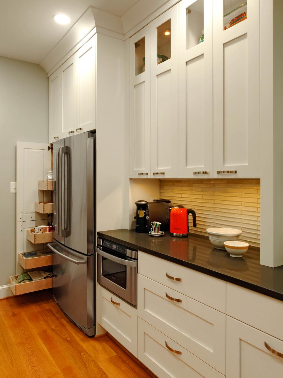 Contemporary Blue Kitchen With Pull-Out Pantry and White Cabinets