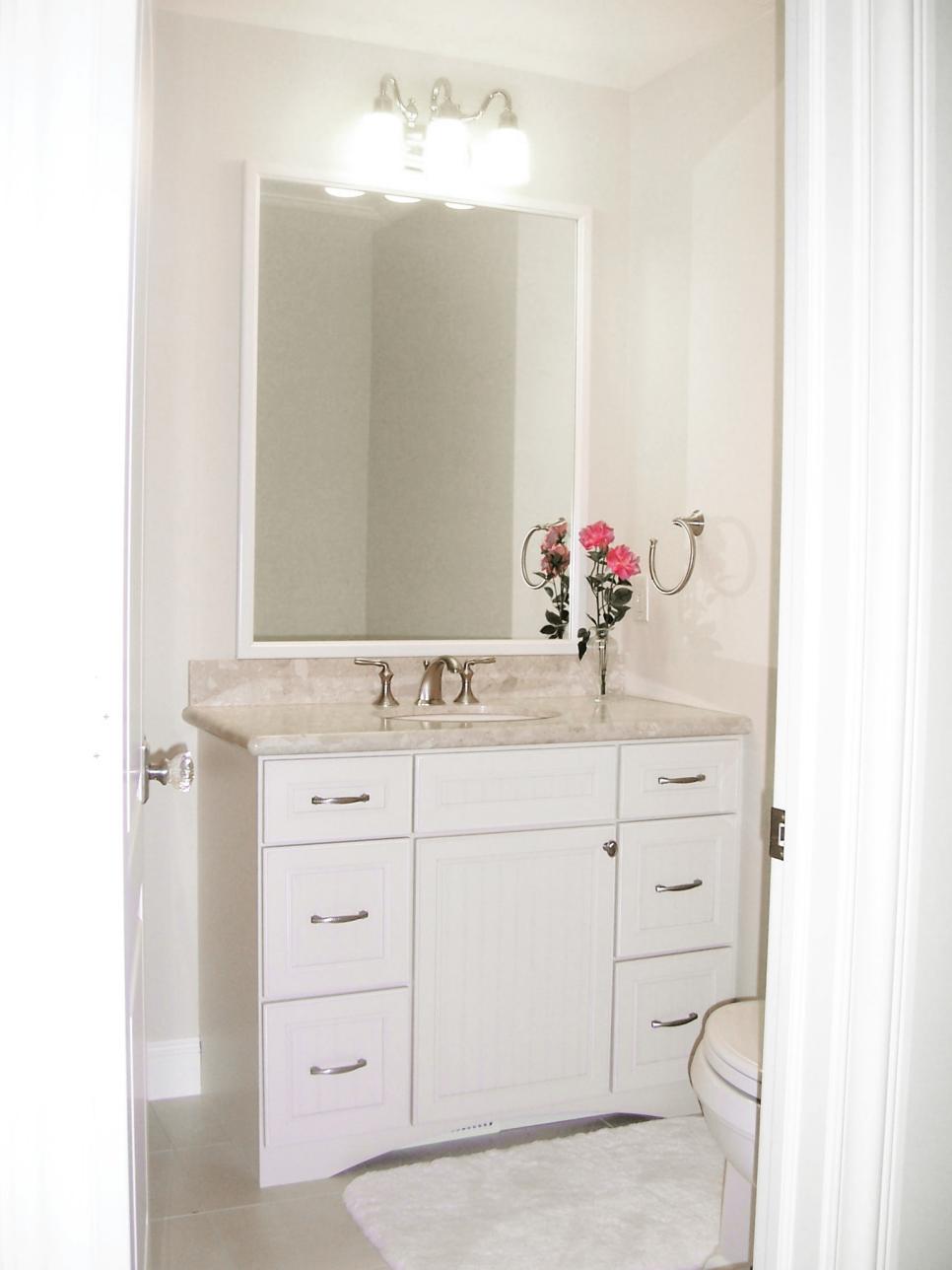 Traditional Beige Powder Room With Shaker-Style Vanity