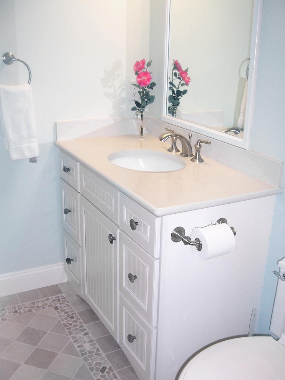 Blue Cottage-Style Bathroom With White Vanity