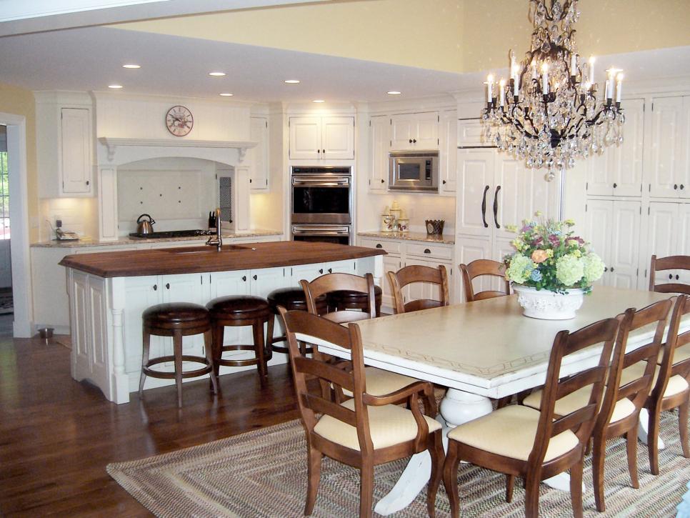 Traditional Kitchen With White Cabinets and Large Eat-In Island