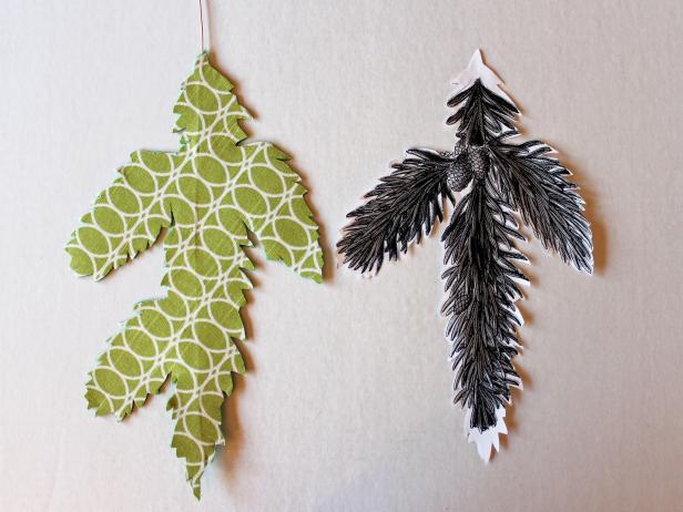 Use sharp scissors to cut out evergreen templates along pencil lines. Tip: Vary the branches' outlines by moving the template around when tracing.