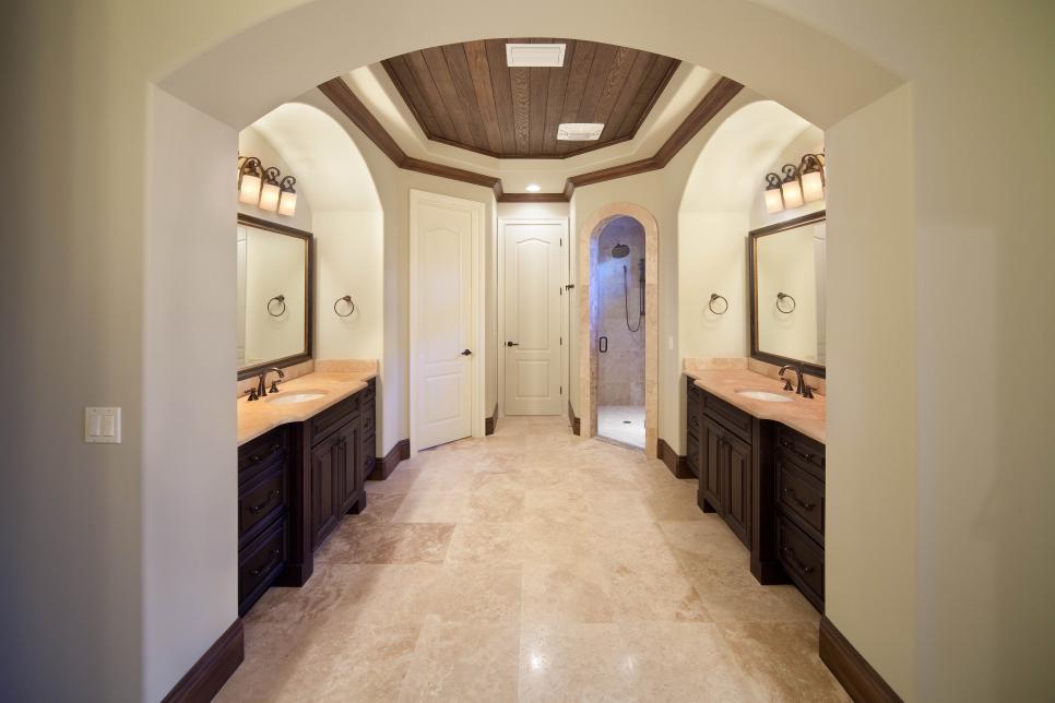 Neutral Bathroom with Arched Entryway, Tongue and Groove Ceiling