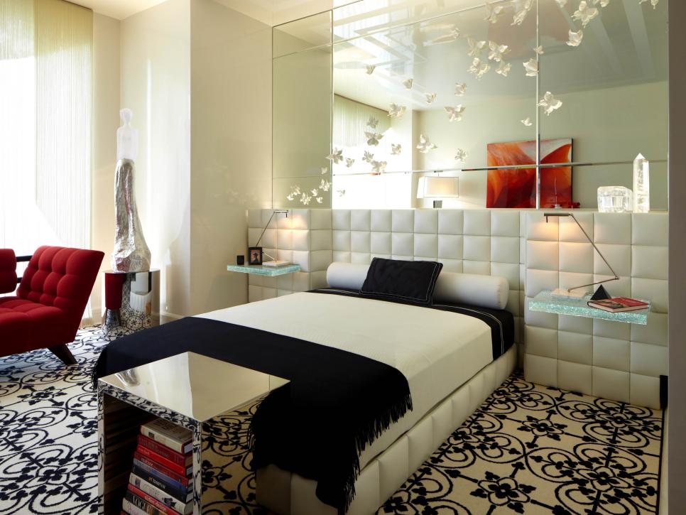 White Bedroom With Mirror Wall and Textured Headboard
