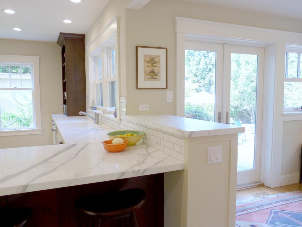 Creamy White Kitchen With Marble Countertop