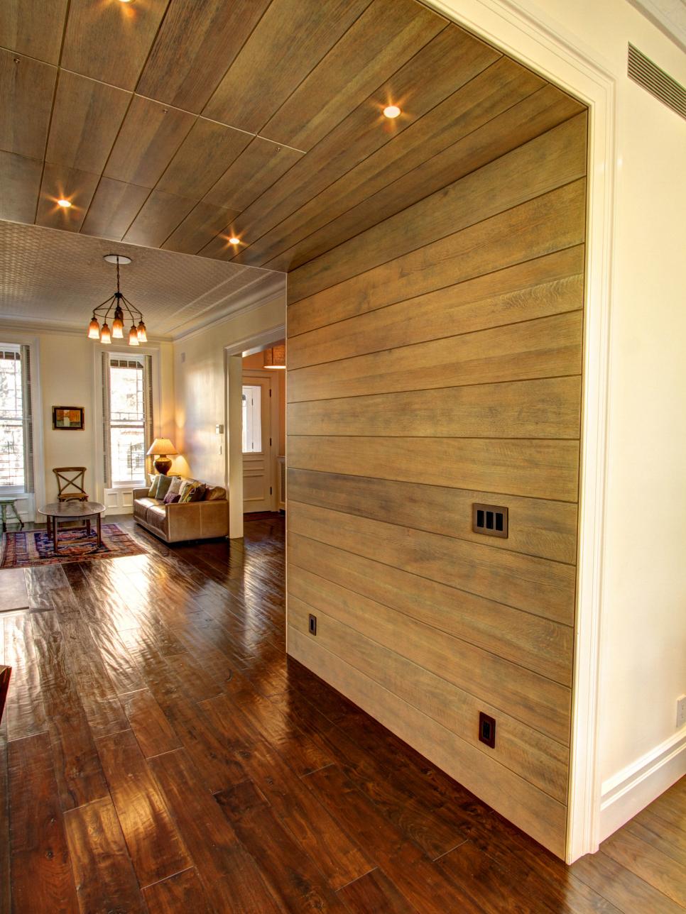 Blue-Gray Oak Hallway With Recessed Lighting and Dark Hardwood Floors