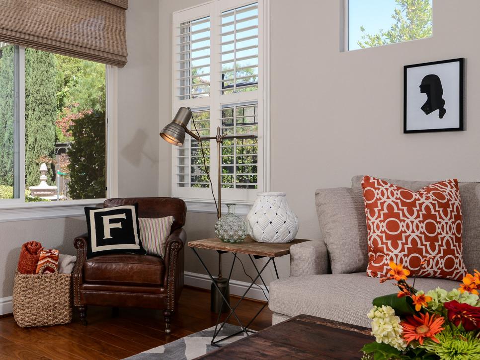 Transitional Living Space Reading Area with Brown and Orange Accents
