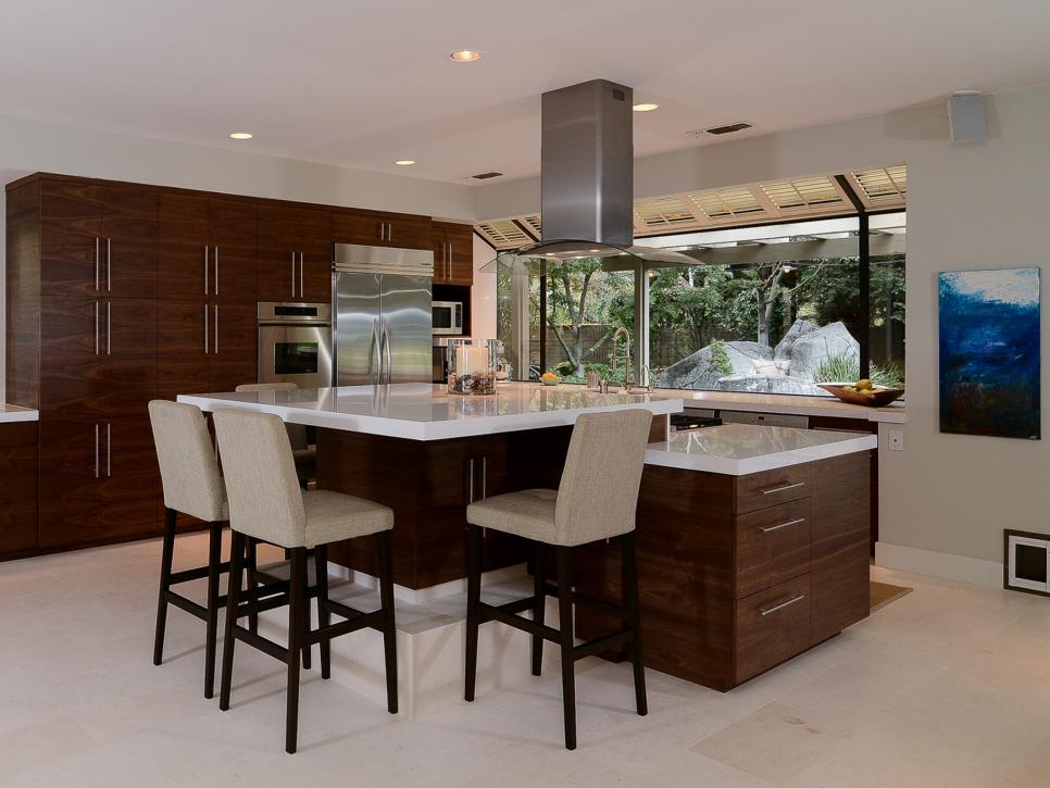 Eat-In Kitchen with Tall Wood Cabinets and Large Island