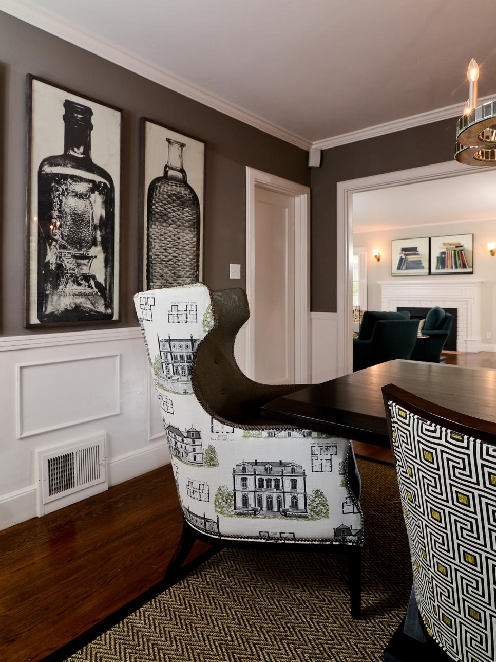 Gray Dining Area With Framed Bottle Prints and Graphic Seats