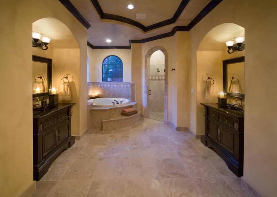 Mediterranean Bathroom With Elevated Tub and Ceiling Details