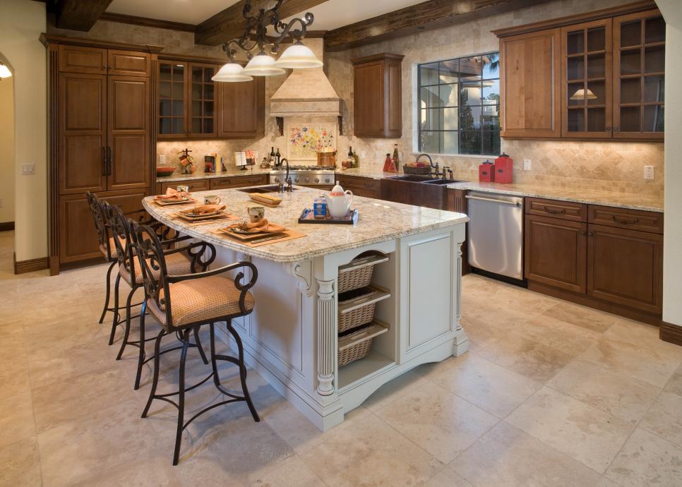 Mediterranean Kitchen with Island, Granite Countertops, and Wood Cabinets