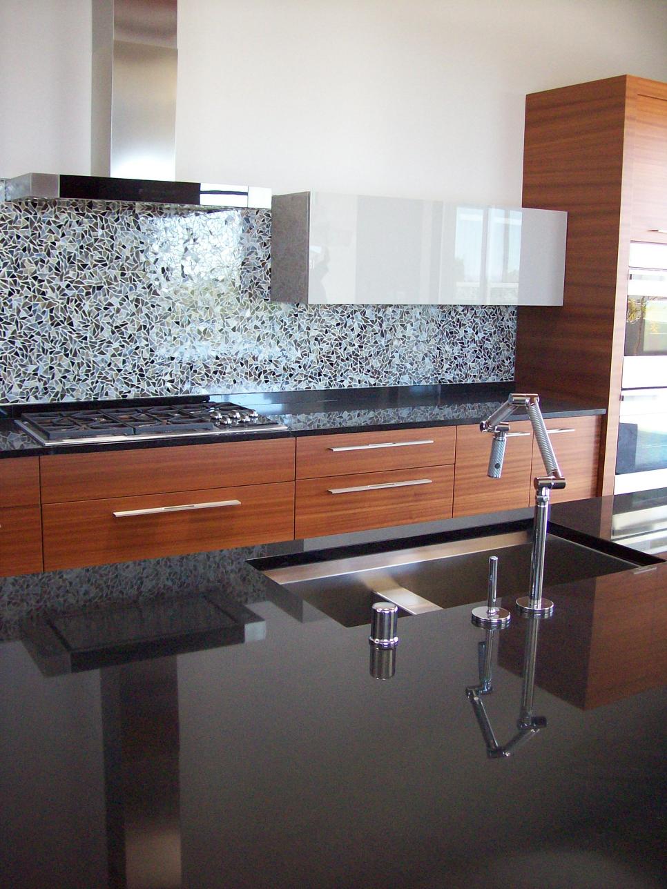 Contemporary Kitchen With Black Granite Countertops