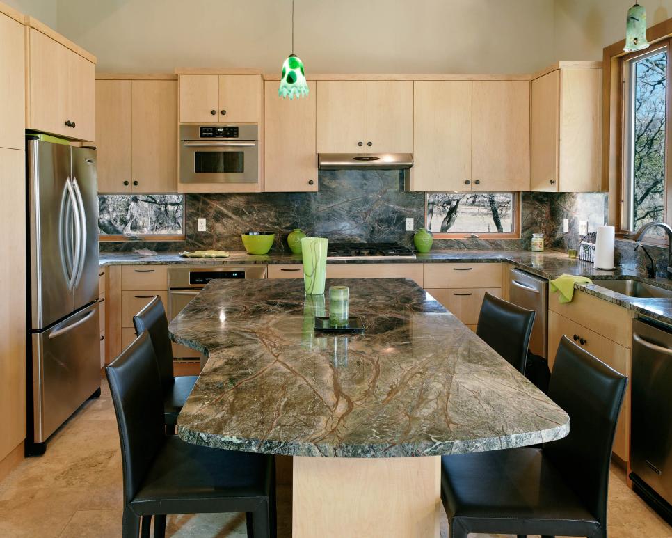 Contemporary Kitchen With Light Cabinets and Green Granite Countertops