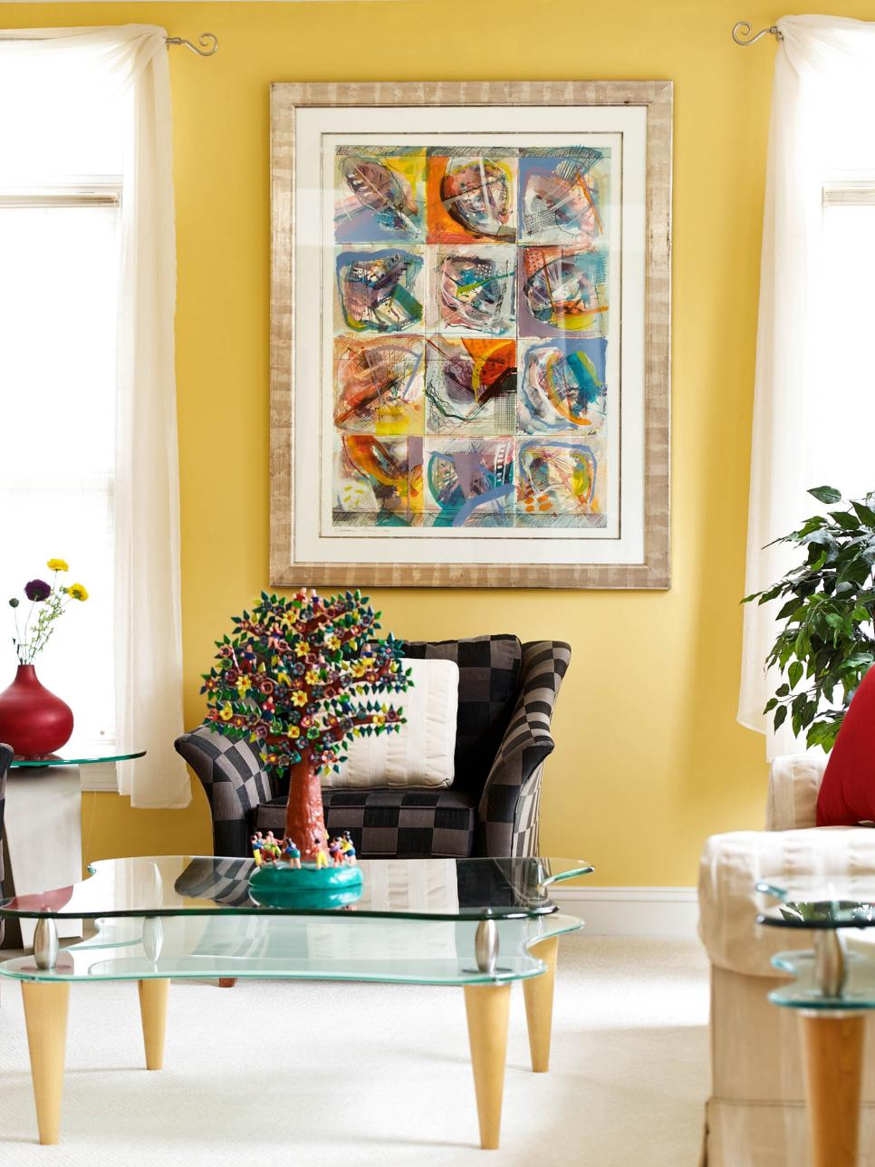 Yellow Living Room With Brown Geometric Chair and Contemporary Art