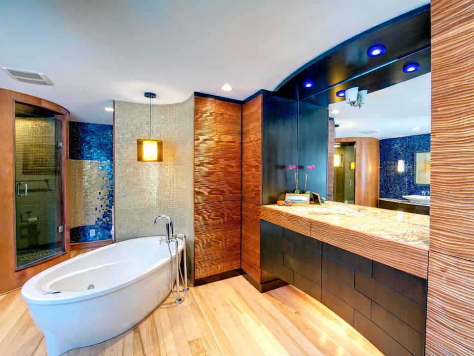 Contemporary Bathroom With Free Standing Tub and Pine Wood Floor