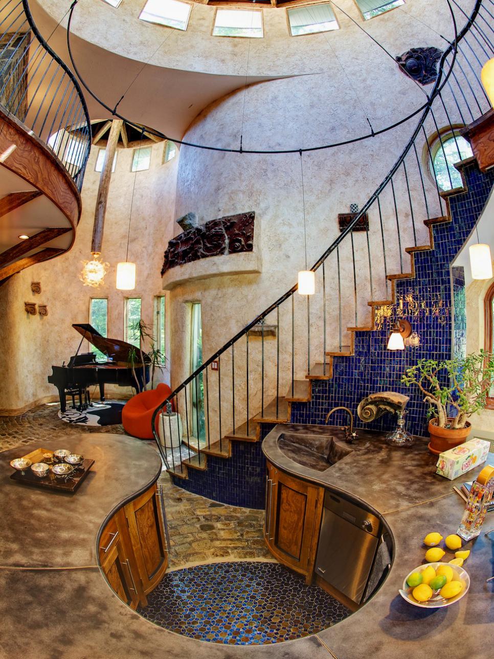 Eclectic Foyer With Grand Staircase and Small Kitchen