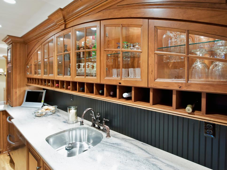 Traditional Built-In Home Bar With Wine Storage and Beadboard
