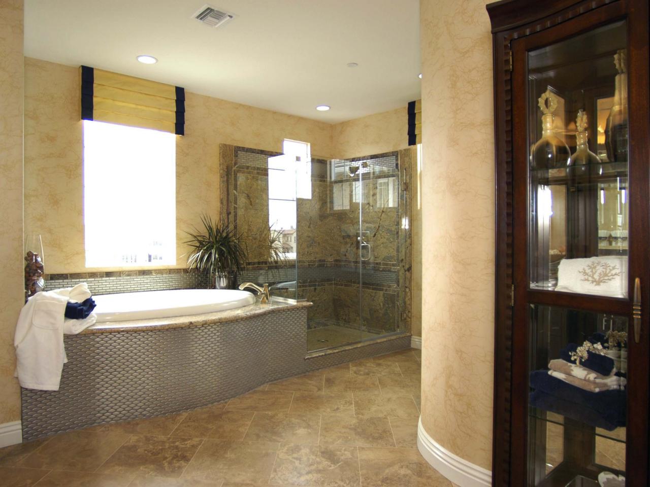 Eclectic Bathroom with Chic Metallic Tub Surround HGTV