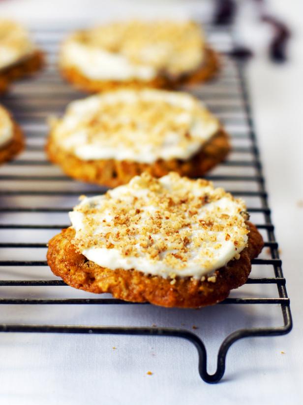 Dense, moist carrot cake is delicious but it can be a bit too heavy after a big meal. These equally delicious cream cheese icing-topped cookies are just the right size when you only have room left for a few bites of dessert. Get the recipe