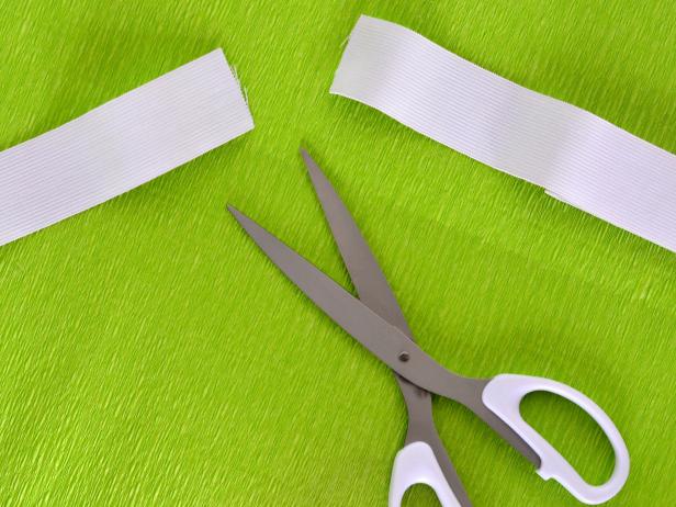 Measure elastic around child's waist and cut to size.