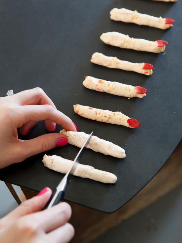 Using Knife to Create Knuckle Lines on Cheese Fingers Using Knife to Create Knuckle Lines on Cheese Fingers