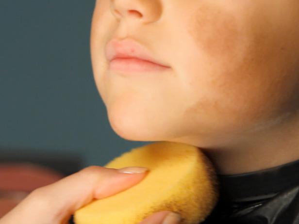 To apply pirate makeup, begin by "dirtying up" the face by using a sponge to smudge brown and yellow eye shadow on child's cheeks, forehead and down the neck. Darken the eyebrows using eye shadow and/or eyeliner pencil, making them look as full and unkempt as possible. Tip: The darker the color and more severe the arch, the more menacing your pirate will look. Add an eye patch. On the eye that is not covered, add dark brown eye shadow underneath to mimic dark circles and collected dirt from endless pillaging and those long months at sea.