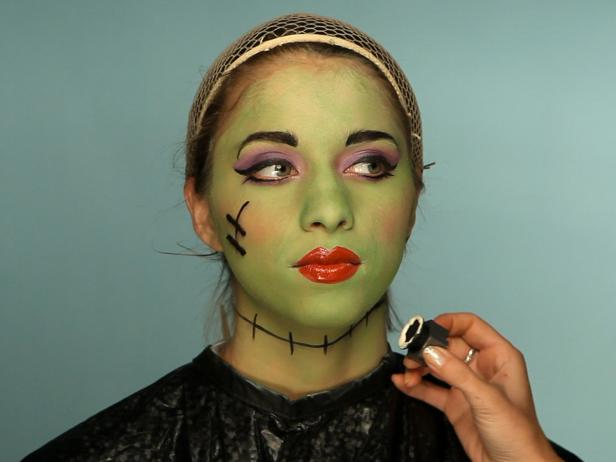 To turn your tween into a hip Frankenstein for Halloween, cover the entire face with green cream makeup. Define brows with a makeup pencil, and cover lids in mauve eyeshadow. Add liner and mascara for older girls. Next, draw stitch lines on face and neck. Add 3-D prosthetic bolts to neck using spirit gum or liquid latex. Make sure to test for allergies first if your child has never used this product before. Tip: You can get fun prosthetic pieces like these at any Halloween supply or costume shop. Use hair mascara to create black and white stripes, or opt for a pre-styled wig to save time and create a more striking impression. Tip: Don't forget to bobby-pin the wig on so it stays put through playtime and trick-or-treating. Finish the look with a plaid ensemble and fashionable accessories.