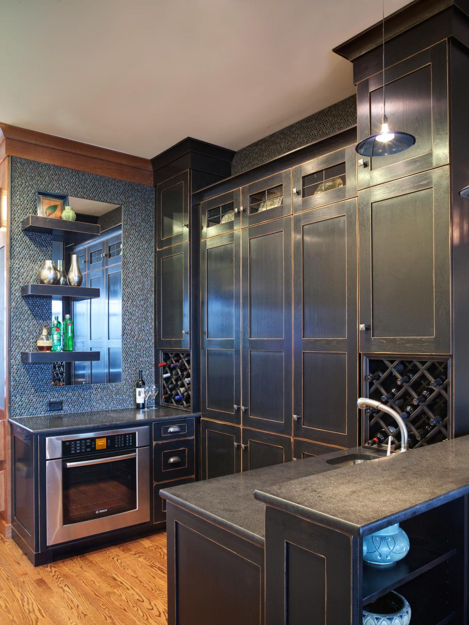 Pass-Through Kitchen With Dark Cabinets & Wine Racks